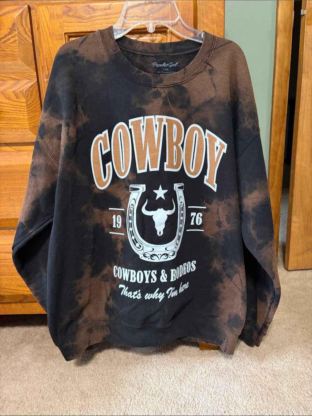 Black and brown sweatshirt- cowboys. 1976.